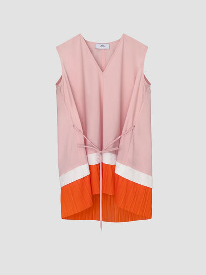 Coral pink Mikoshi blouse with orange pleats