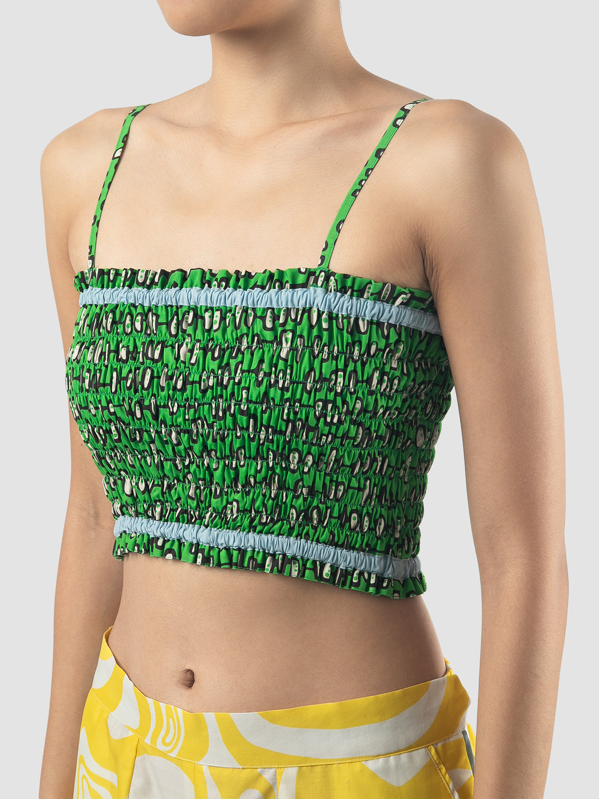 Green Flo bralette with geometric pattern