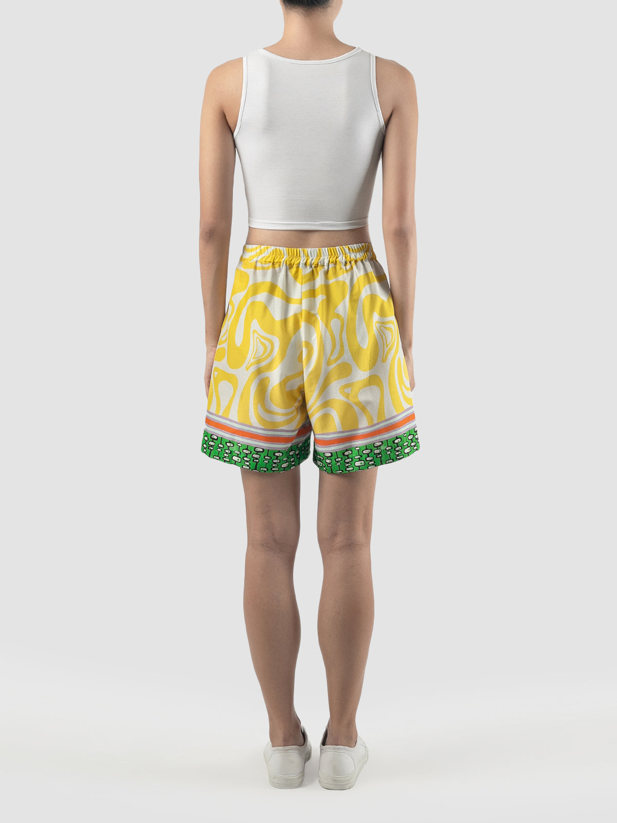 Yellow Edna shorts with swirl pattern