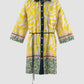 Yellow Althea shirt-dress with swirl pattern