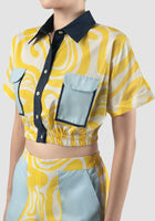 Yellow Edna crop shirt with swirl pattern