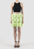 Tristus deco green statement mini skirt with scalloped lapels