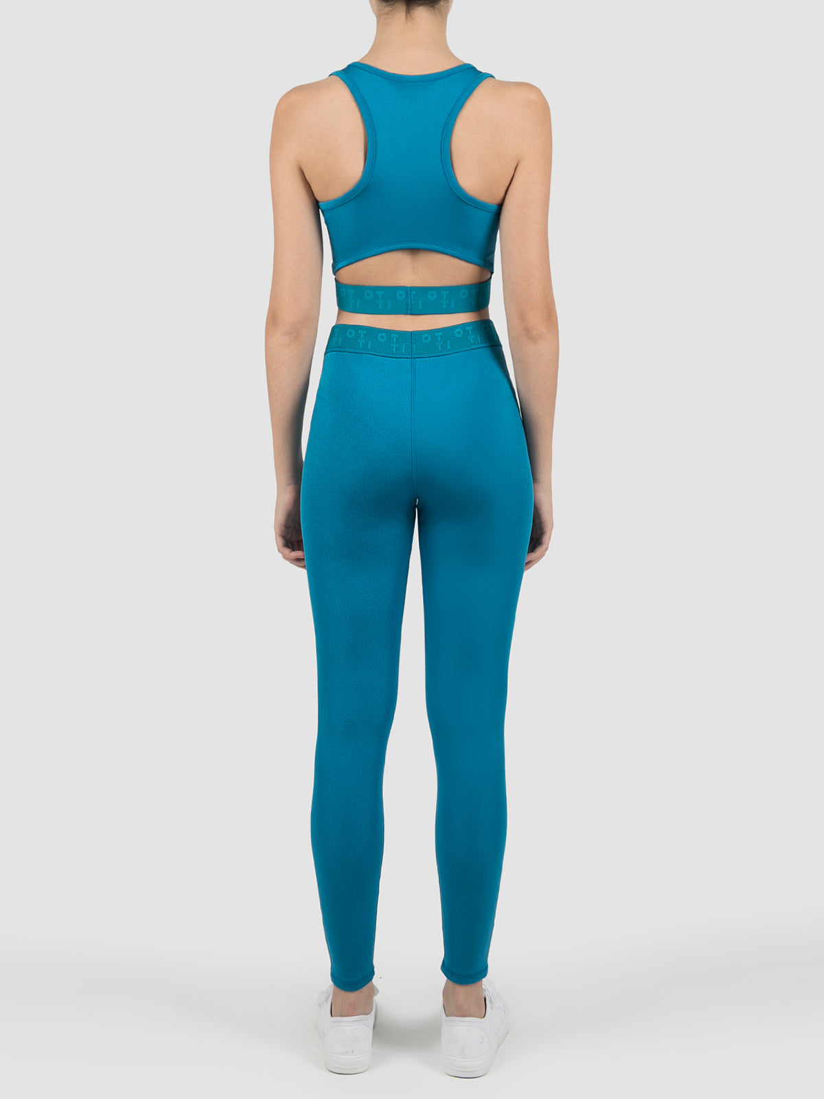 Blue bonded jersey silk sheen racer crop top