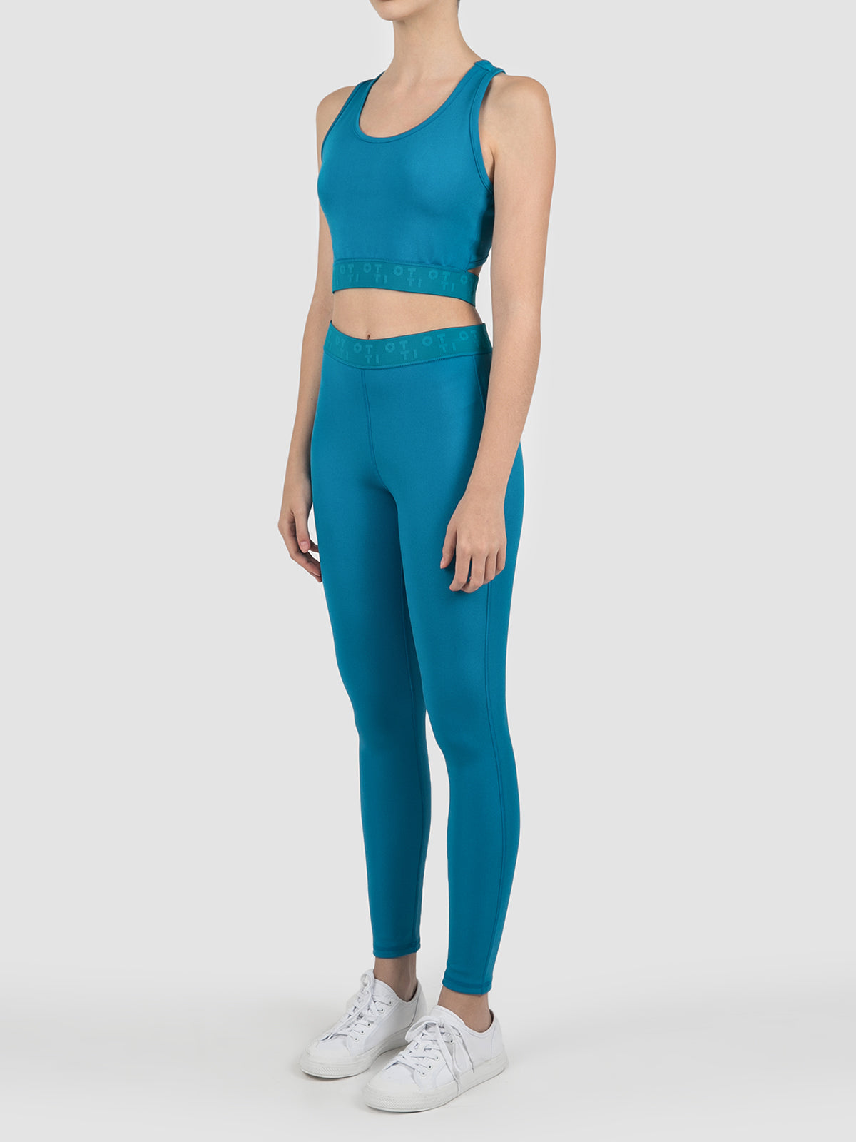 Blue bonded jersey silk sheen racer crop top