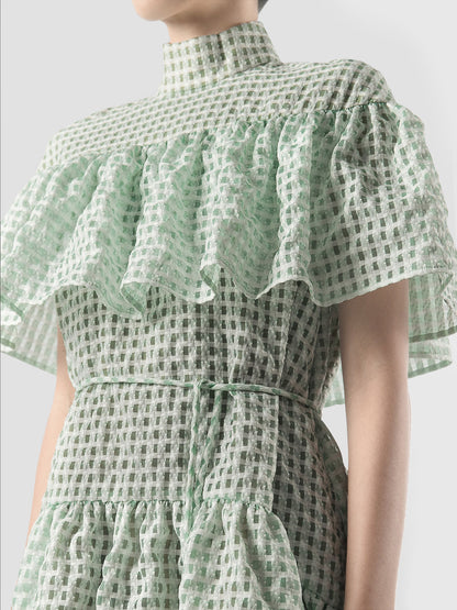 Marmoreal mint green turtleneck ruffled mini dress