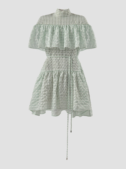 Marmoreal mint green turtleneck ruffled mini dress