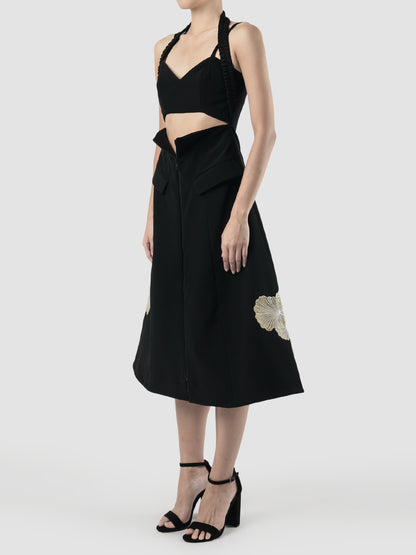 Black halter dress with gold embroidery