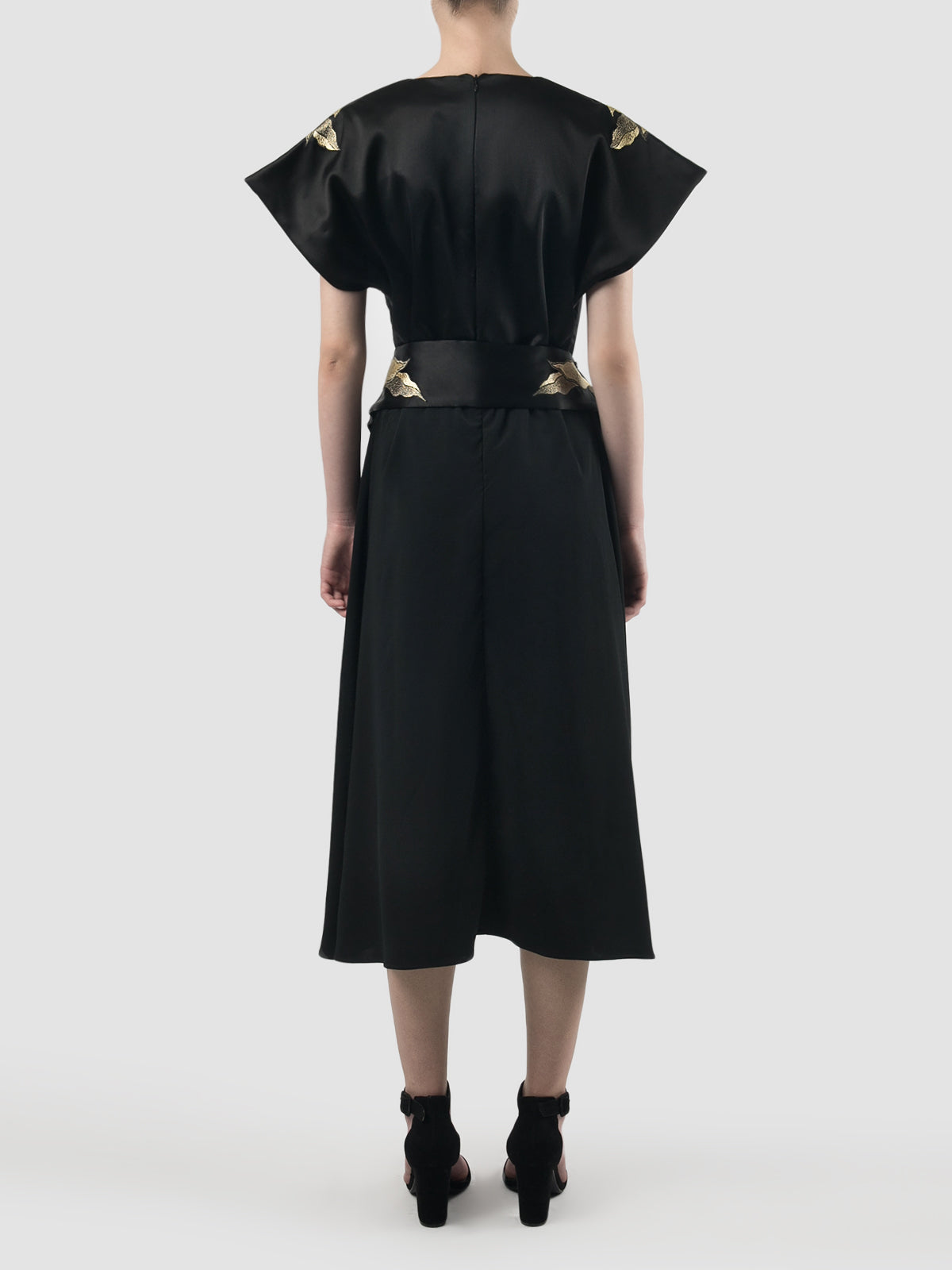 Black kimono dress with waist cutout details